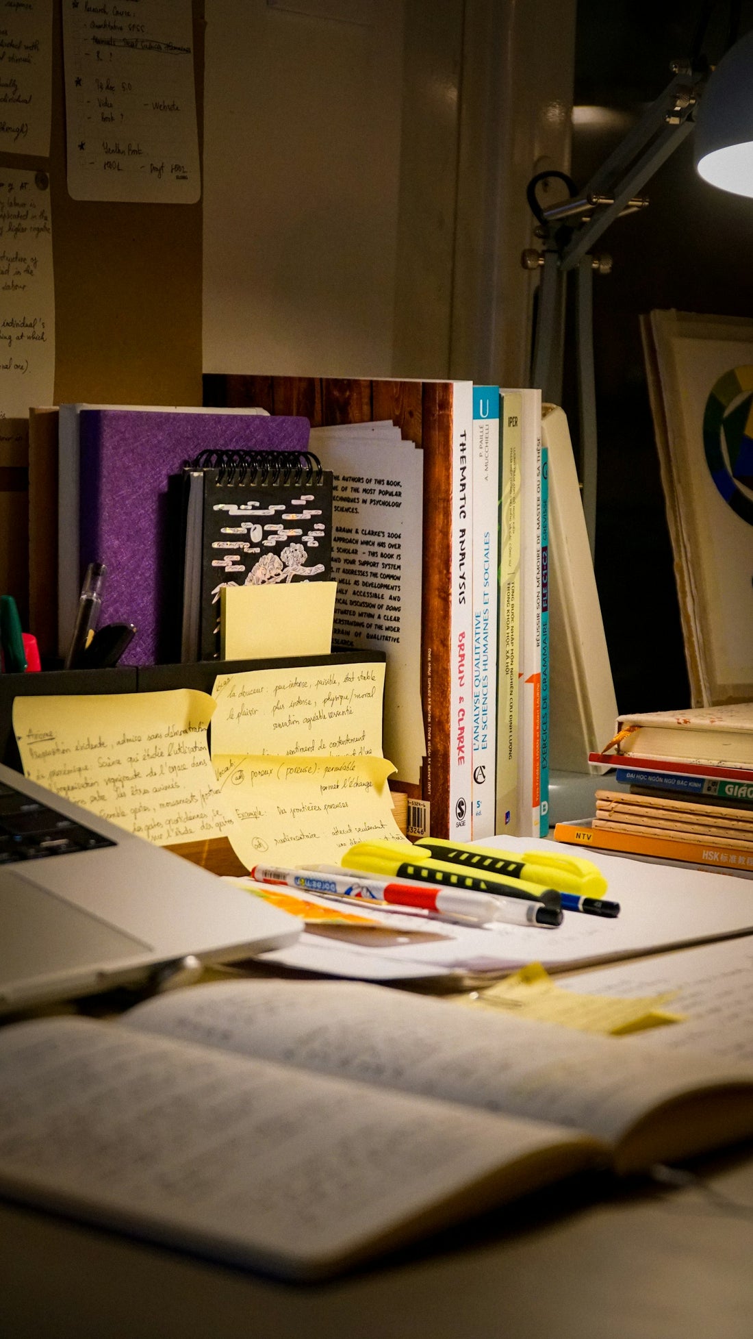 Desk with laptop and study materials
